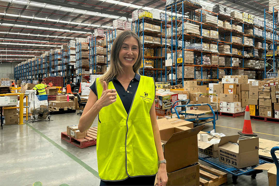 Thumbs up in warehouse